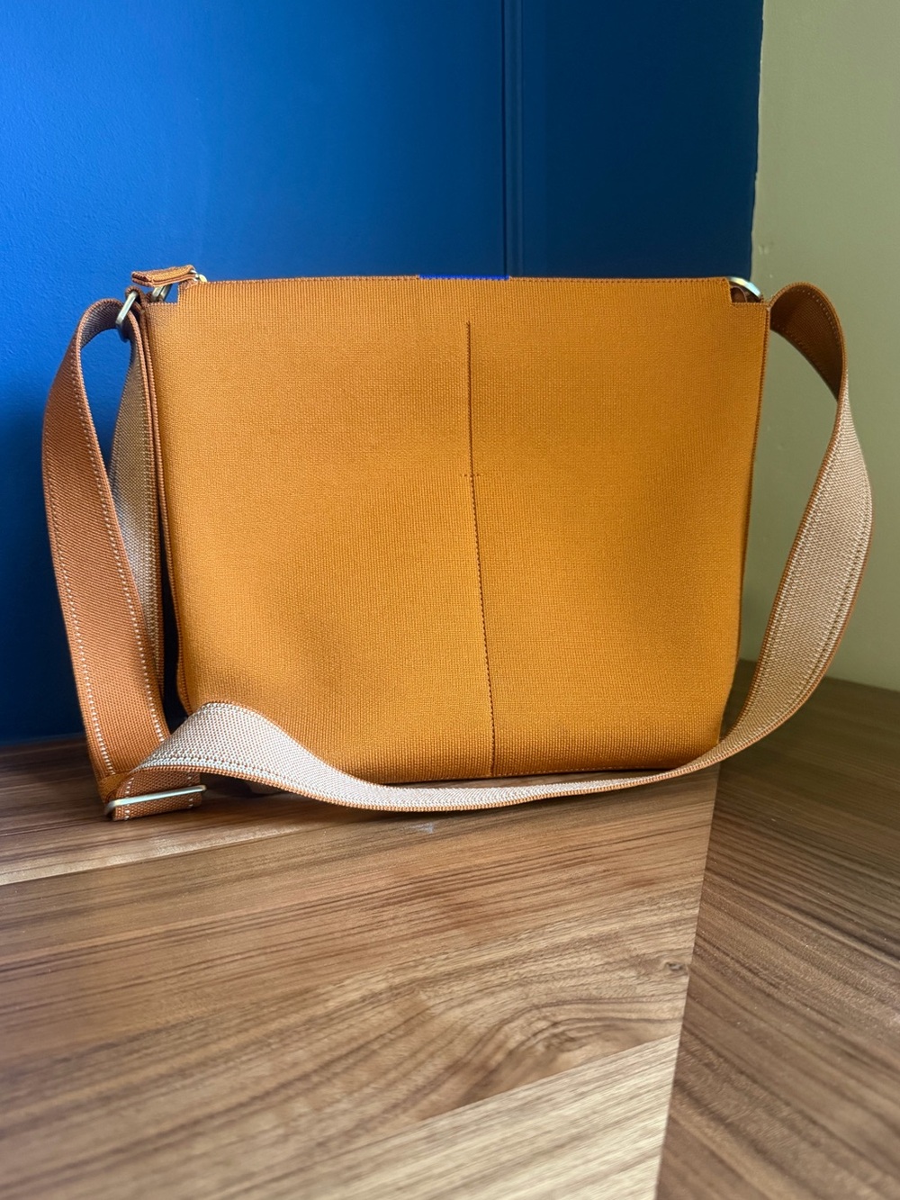Rothy’s Mini Zip Bucket Bag in Amber Brown
